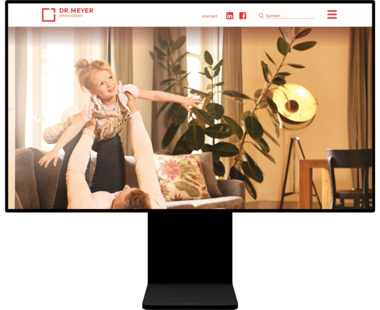 Screenshot auf Laptop-Bildschirm der Startseite der Dr.Meyer Immobilien AG Corporate-Website.